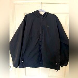Adidas Crinkle Shell Jacket size Large color Black. Gender Neutral wear.